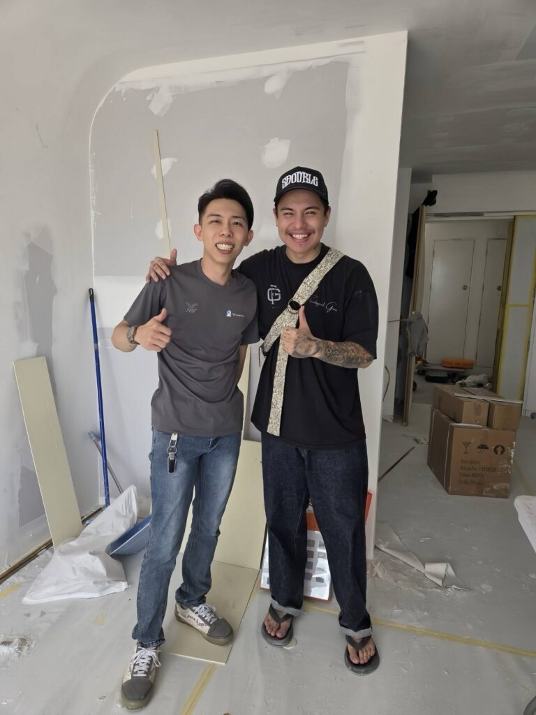 The Curtain Expert installer with a happy customer at a Singapore home renovation site